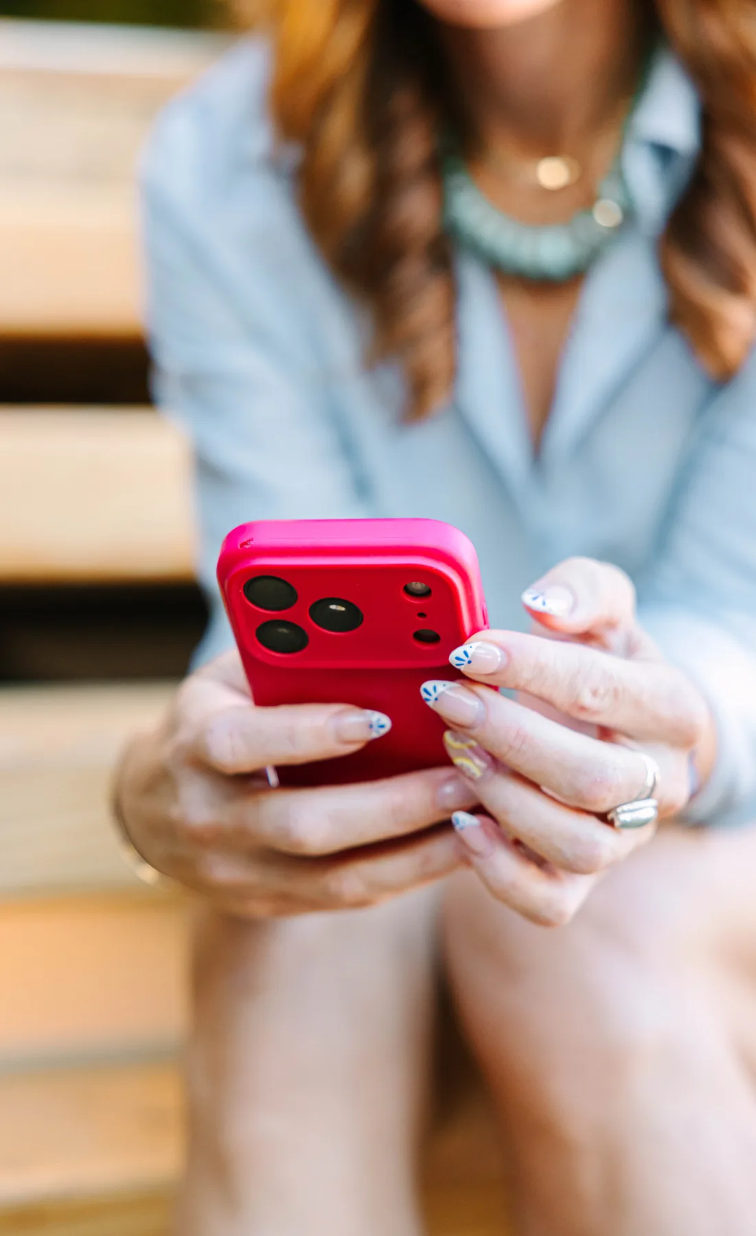 Ryanne Day creating UGC content on her phone